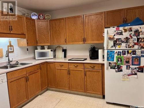 101 102 1St Avenue, Caronport, SK - Indoor Photo Showing Kitchen With Double Sink