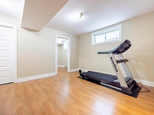 Basement - 34 Rue De Fontenelle, Candiac, QC - Indoor Photo Showing Gym Room