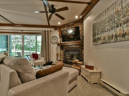 Salon - 7-102 Ch. Des Quatre-Sommets, Mont-Tremblant, QC - Indoor Photo Showing Living Room With Fireplace