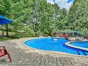 Piscine - 7-102 Ch. Des Quatre-Sommets, Mont-Tremblant, QC  - Outdoor With In Ground Pool With Backyard 