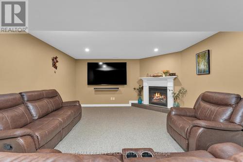 384 Boismier Avenue, Lasalle, ON - Indoor Photo Showing Living Room With Fireplace