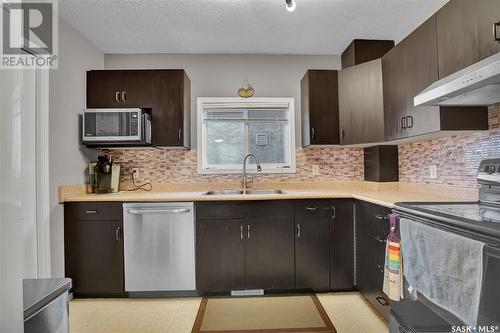 210 L Avenue N, Saskatoon, SK - Indoor Photo Showing Kitchen With Double Sink