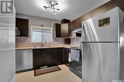 210 L Avenue N, Saskatoon, SK - Indoor Photo Showing Kitchen With Double Sink