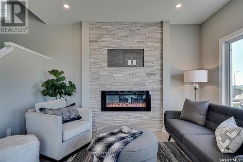 443 Doran Crescent, Saskatoon, SK - Indoor Photo Showing Living Room With Fireplace