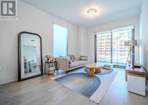 322 - 118 Merchants' Wharf Avenue, Toronto, ON - Indoor Photo Showing Living Room