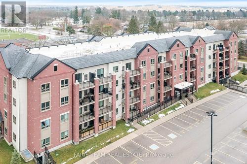 406 - 161 Wellington Street E, New Tecumseth, ON - Outdoor With Balcony With Facade