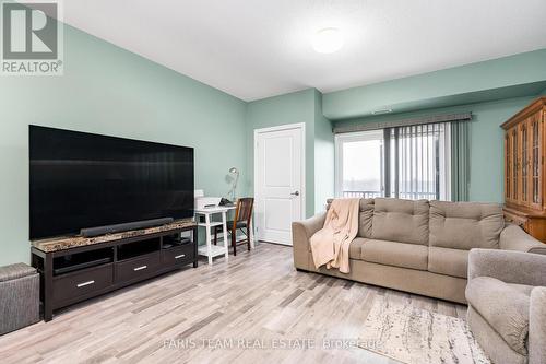 406 - 161 Wellington Street E, New Tecumseth, ON - Indoor Photo Showing Living Room