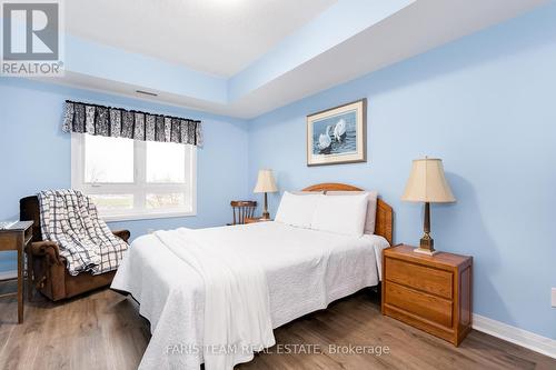 406 - 161 Wellington Street E, New Tecumseth, ON - Indoor Photo Showing Bedroom