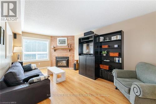 125 Ferndale Drive S, Barrie, ON - Indoor Photo Showing Living Room With Fireplace