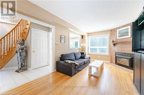 125 Ferndale Drive S, Barrie, ON - Indoor Photo Showing Living Room With Fireplace