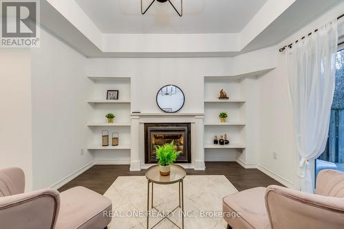 4152 Galileo Common, Burlington, ON - Indoor Photo Showing Living Room With Fireplace