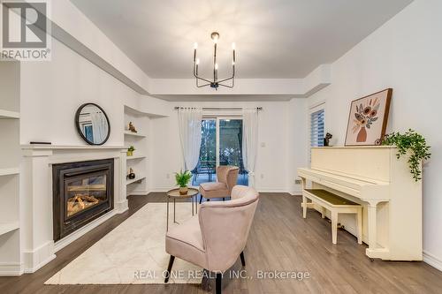 4152 Galileo Common, Burlington, ON - Indoor Photo Showing Living Room With Fireplace