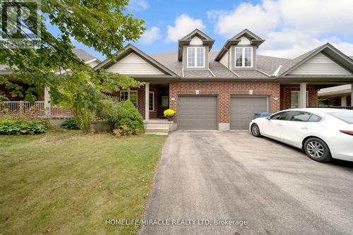 93 Lynch Circle S, Guelph, ON - Outdoor With Facade