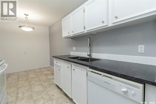 306B 4040 8Th Street E, Saskatoon, SK - Indoor Photo Showing Kitchen With Double Sink