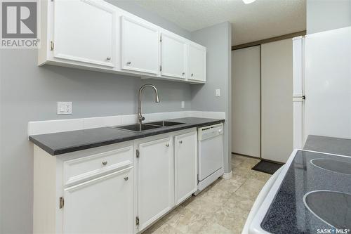 306B 4040 8Th Street E, Saskatoon, SK - Indoor Photo Showing Kitchen With Double Sink