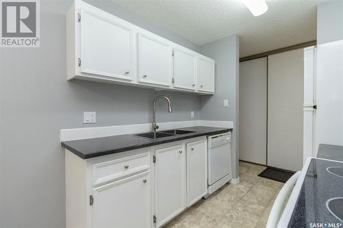 306B 4040 8Th Street E, Saskatoon, SK - Indoor Photo Showing Kitchen With Double Sink