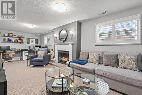 7169 Viscount Street, Niagara Falls (212 - Morrison), ON - Indoor Photo Showing Living Room With Fireplace