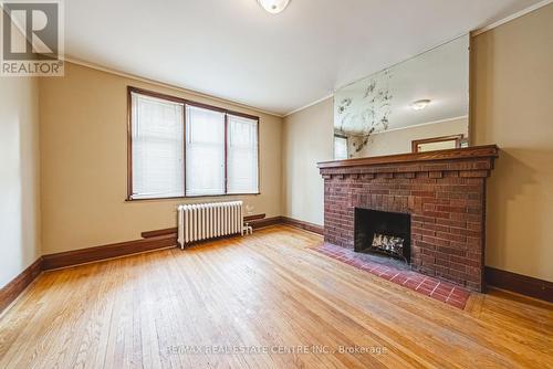 8 Main Street, Toronto, ON - Indoor Photo Showing Living Room With Fireplace