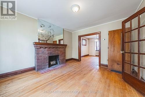 8 Main Street, Toronto, ON - Indoor Photo Showing Living Room With Fireplace