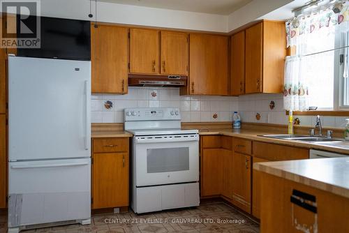 410 Farah Avenue, Temiskaming Shores (New Liskeard), ON - Indoor Photo Showing Kitchen With Double Sink