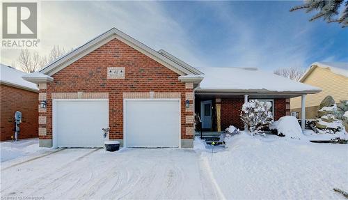 View of front facade with a garage - 42 River Run Road, Drayton, ON - Outdoor