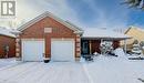 View of front facade with a garage - 42 River Run Road, Drayton, ON  - Outdoor 