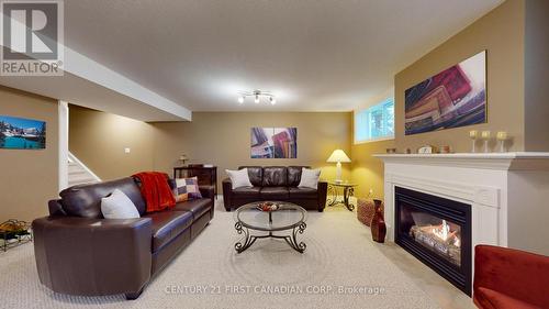 40 - 2100 Denview Avenue, London, ON - Indoor Photo Showing Living Room With Fireplace