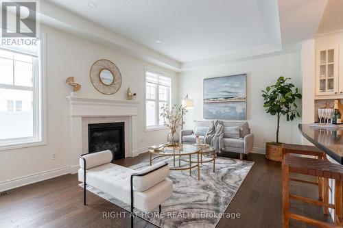 156 Cranesbill Road, Ottawa, ON - Indoor Photo Showing Living Room With Fireplace