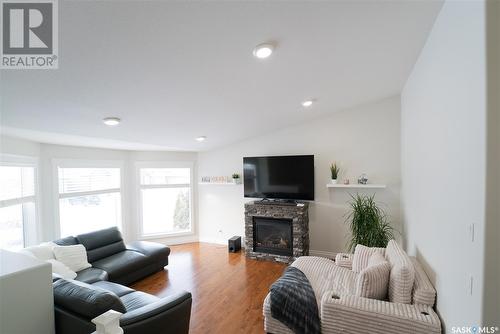 515 Antler Crescent, Warman, SK - Indoor Photo Showing Living Room With Fireplace