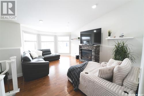 515 Antler Crescent, Warman, SK - Indoor Photo Showing Living Room With Fireplace