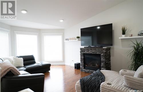 515 Antler Crescent, Warman, SK - Indoor Photo Showing Living Room With Fireplace