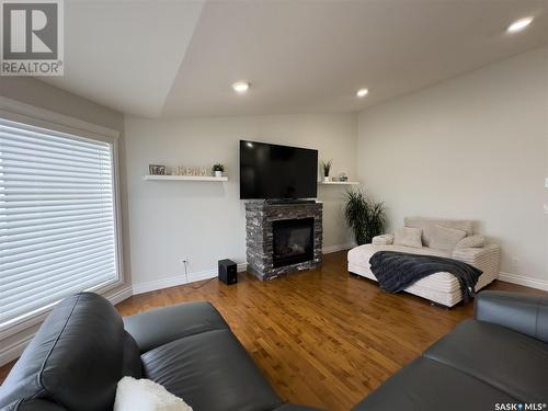 515 Antler Crescent, Warman, SK - Indoor Photo Showing Living Room With Fireplace