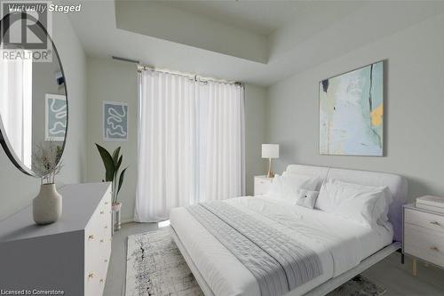 Bedroom with a raised ceiling. Virtually staged - 55 Duke Street Unit# 322, Kitchener, ON - Indoor Photo Showing Bedroom