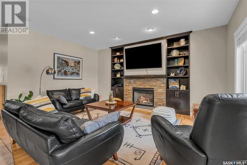 723 Bayview Close, Saskatoon, SK - Indoor Photo Showing Living Room With Fireplace