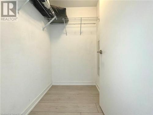 View of walk in closet - 55 Duke Street W Unit# 1210, Kitchener, ON - Indoor With Storage