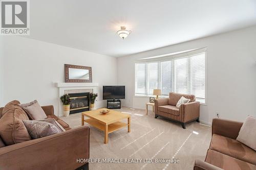 5 Valleywest Road, Brampton, ON - Indoor Photo Showing Living Room With Fireplace