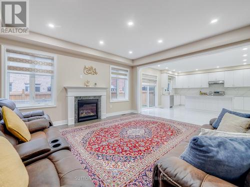 1527 Mendelson Heights, Milton, ON - Indoor Photo Showing Living Room With Fireplace