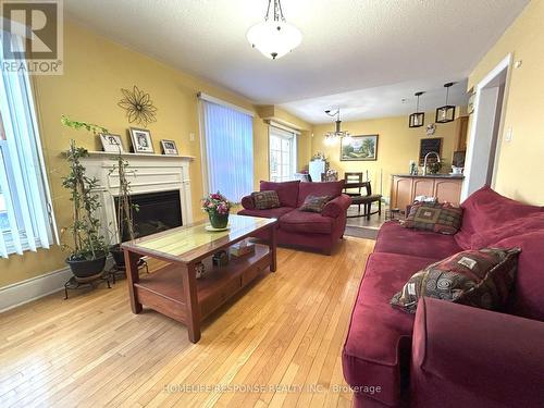 19 River Rock Crescent, Brampton, ON - Indoor Photo Showing Living Room With Fireplace