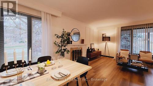 3161 The Credit Woodlands, Mississauga, ON - Indoor Photo Showing Dining Room With Fireplace