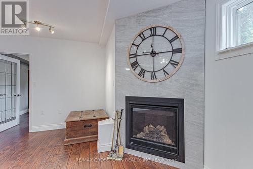 1104 Alfred Street, Innisfil, ON - Indoor Photo Showing Living Room With Fireplace