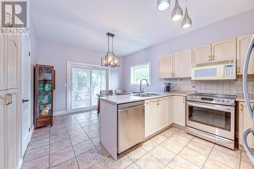 1104 Alfred Street, Innisfil, ON - Indoor Photo Showing Kitchen With Double Sink