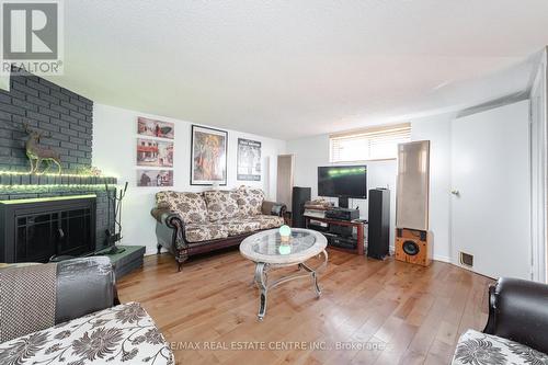 17 Ashurst Crescent, Brampton, ON - Indoor Photo Showing Living Room With Fireplace