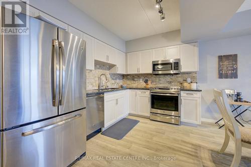 612 - 155 Water Street S, Cambridge, ON - Indoor Photo Showing Kitchen With Double Sink