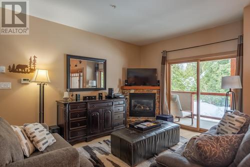 1003 Mountain View Road Unit# B, Rossland, BC - Indoor Photo Showing Living Room With Fireplace