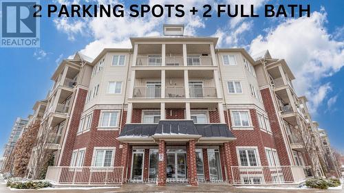 211 - 84 Aspen Springs Drive, Clarington, ON - Outdoor With Balcony With Facade