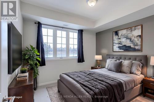 211 - 84 Aspen Springs Drive, Clarington, ON - Indoor Photo Showing Bedroom