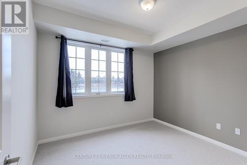 211 - 84 Aspen Springs Drive, Clarington, ON - Indoor Photo Showing Other Room