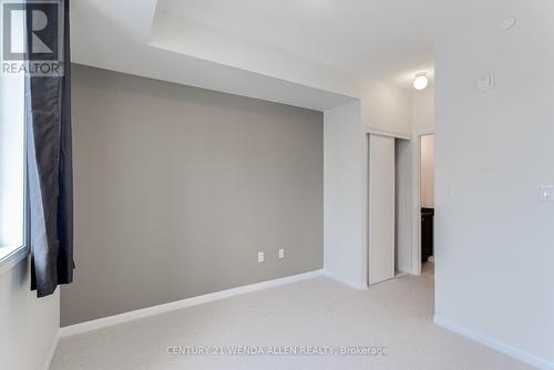 211 - 84 Aspen Springs Drive, Clarington, ON - Indoor Photo Showing Other Room