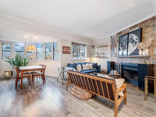 Th6-80 Adelaide St E, Toronto, ON - Indoor Photo Showing Living Room With Fireplace