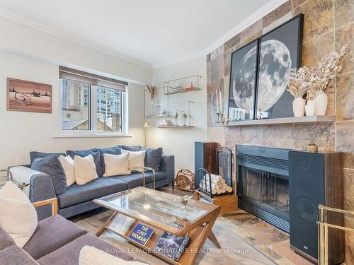 Th6-80 Adelaide St E, Toronto, ON - Indoor Photo Showing Living Room With Fireplace